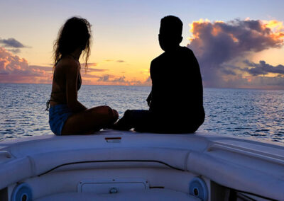 blue pelican boat charter - sunset couple